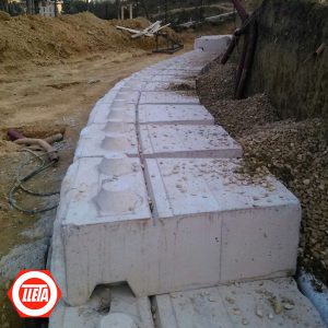 Base de muro de contención